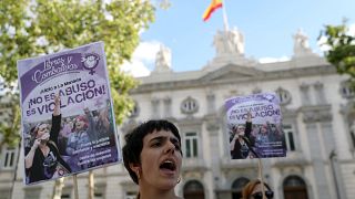 FILE PHOTO: Women gather outside the Supreme Court after Spain's top court found five men known as the "Wolf Pack" guilty of rape in Madrid, Spain, June 21, 2019.