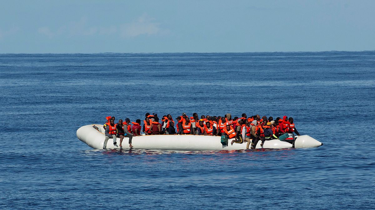A rubber dinghy carrying migrants rescued by German NGO Sea-Eye ship Alan Kurdi is pictured at sea in the Mediterranean, October 26, 2019. Picture taken October 26, 2019. 