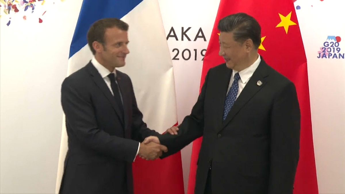 Macron in China: French president to discuss trade, climate with Xi Jinping