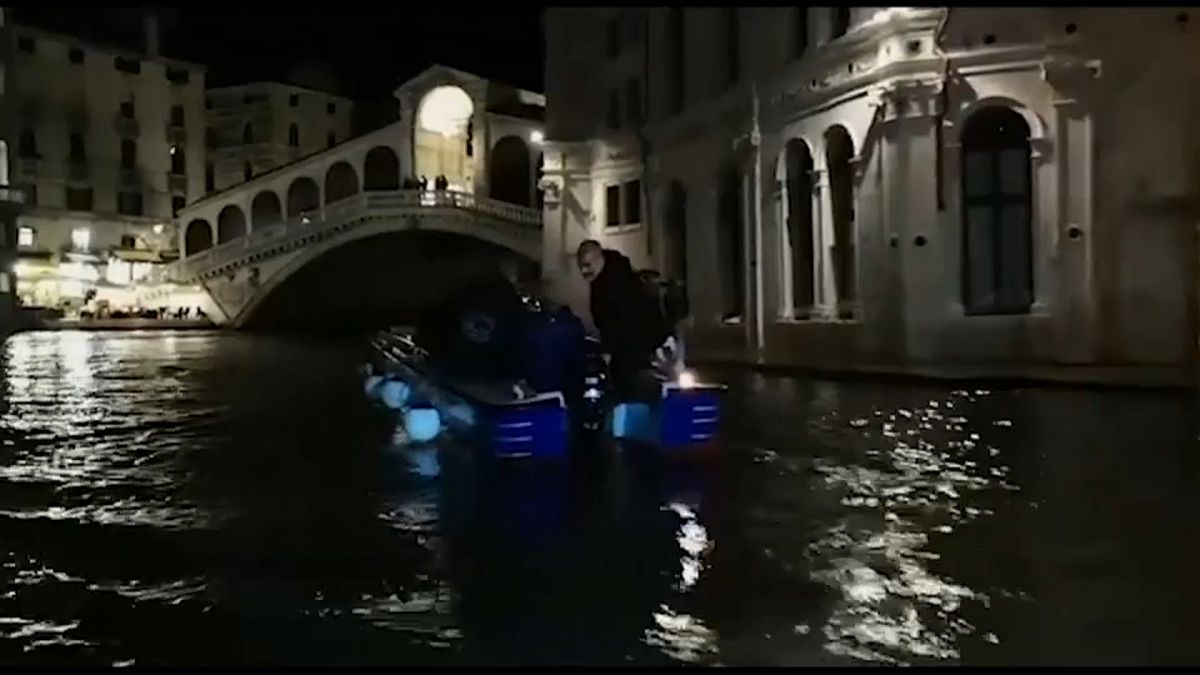 Watch: Gondoliers don scuba gear to clean Venice canals