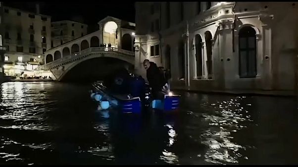 Watch: Gondoliers don scuba gear to clean Venice canals Watch: Gondoliers don scuba gear to clean Venice canals