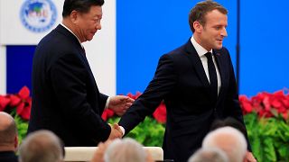 Ambiente e comércio dominam visita de Emmanuel Macron à China