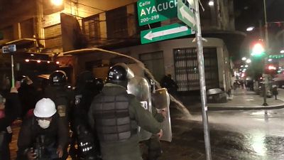 Police and protesters clash in Bolivia's La Paz