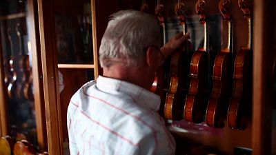 Watch: Award-winning violin maker made his first instrument for his son