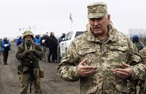 Senior Ukrainian army representative, Bogdan Bondar, speaks to the press during the withdrawal of the Ukrainian forces near Bogdanivka village