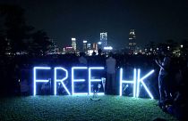 Vigil in Hong Kong after death of student protester