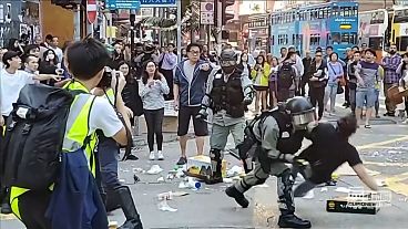 Hong Kong police shoot protester as chaos erupts across city