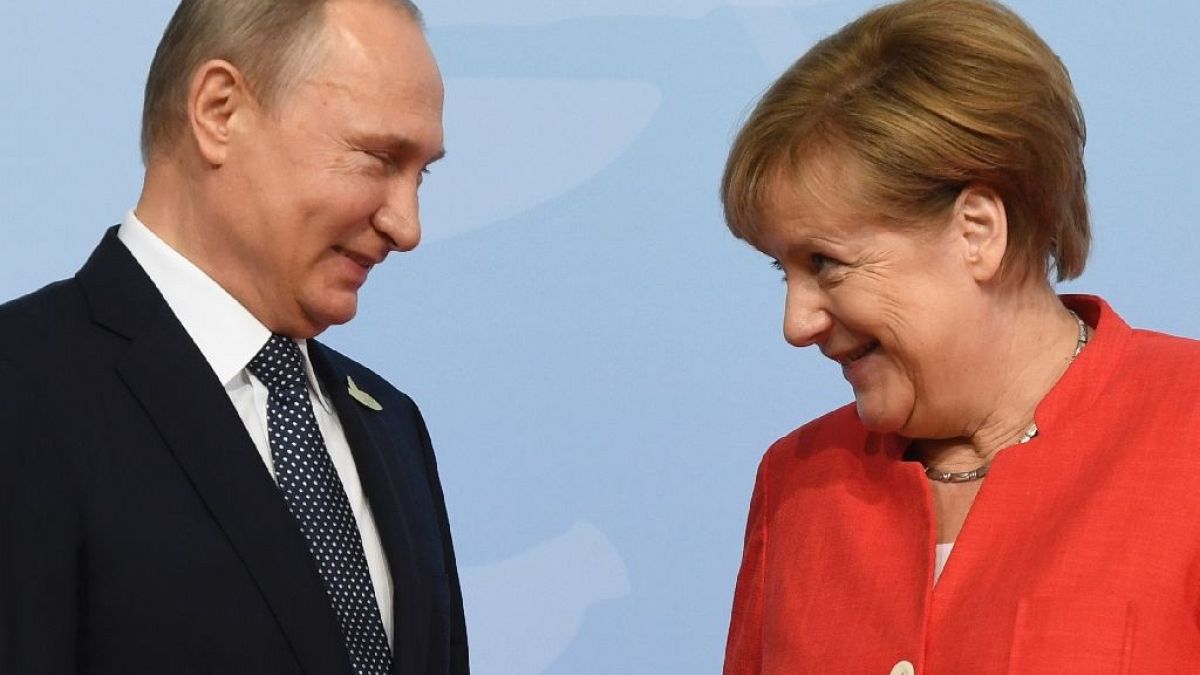 Vladimir Putin ve Angela Merkel