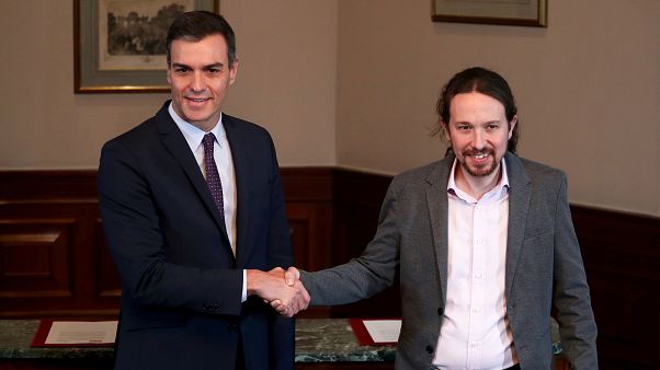 Pedro Sánchez y Pablo Iglesias firman un acuerdo para una coalición de gobierno en España Pedro Sánchez y Pablo Iglesias firman un acuerdo para una coalición de gobierno en España