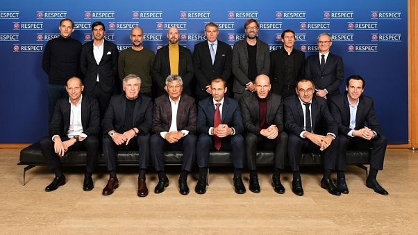 Presenti a Nyon: in piedi Tuchel, Fonseca, Guardiola, ten Hag, Rosetti, Klopp, Garcia, Marchetti. Accosciati: Allegri, Ancelotti, Lucescu, Ceferin, Zidane, Sarri, Emery. Presenti a Nyon: in piedi Tuchel, Fonseca, Guardiola, ten Hag, Rosetti, Klopp, Garcia, Marchetti. Accosciati: Allegri, Ancelotti, Lucescu, Ceferin, Zidane, Sarri, Emery.