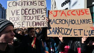 Students protest outside a campus building after a 22-year-old man set himself alight over financial problems, Lyon, France, November 12, 2019.