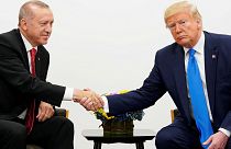 U.S. President Donald Trump shakes hands during a bilateral meeting with Turkey's President Tayyip Erdogan during the G20 leaders summit in Osaka, Japan, June 29, 2019.