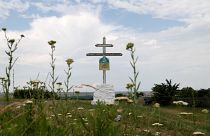 A view shows a cross near the crash site of Malaysia Airlines Flight MH17 plane outside Hrabove