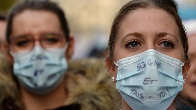 French hospitals and health workers on strike attend a demonstration in Paris