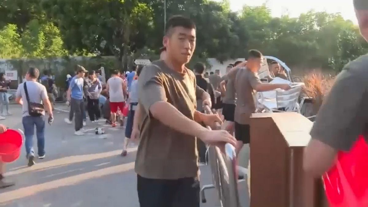China sends troops onto Hong Kong's street's to clean up after protests
