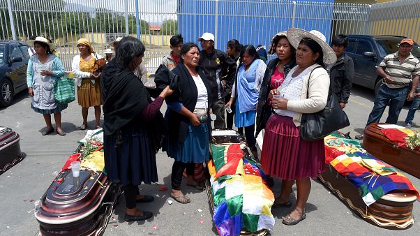 Eine Familie trauert um ein bei den Protesten getötetes Mitglied. Eine Familie trauert um ein bei den Protesten getötetes Mitglied.
