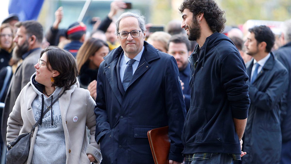Catalan regional leader Quim Torra (C) arrives to appear before a judge at the High Court of Justice of Catalonia in Barcelona, Spain, November 18, 2019. 