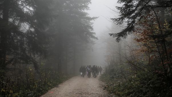 File photo of migrants crossing into Croatia from Bosnia on November 14. File photo of migrants crossing into Croatia from Bosnia on November 14.