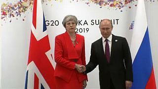 Theresa May confronts Vladimir Putin over poisoning of former Russian spy in UK