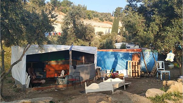 A refugee camp in Greece which will be replaced with a closed detention centre A refugee camp in Greece which will be replaced with a closed detention centre
