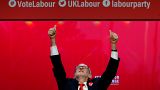 Jeremy Corbyn waves to cheering students at the Labour manifesto launch