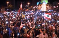 How are Lebanese protesters using art to express their views?