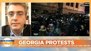 Georgian riot police deploy water cannon as protesters in Tbilisi try to blockade parliament