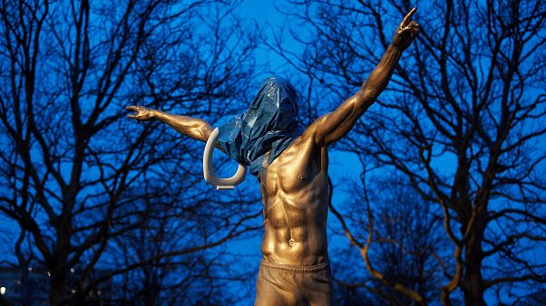 Zlatan Ibrahimovic's statue was adorned with a toilet seat by an angry Malmo fan Zlatan Ibrahimovic's statue was adorned with a toilet seat by an angry Malmo fan