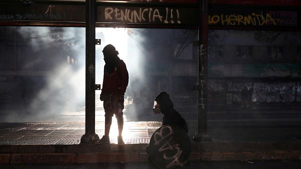 Protesters have been taking to Chile's streets for weeks Protesters have been taking to Chile's streets for weeks