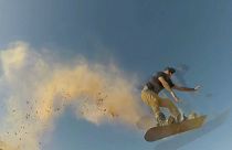 На доске по барханам