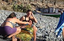 Members of the public came to the aid of the exhausted migrants on a Canary Islands beach