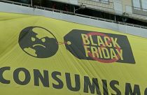 Black Friday protesters picket Amazon as Greenpeace demonstrate in Madrid