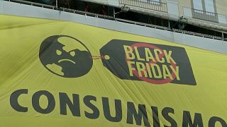 Black Friday protesters picket Amazon as Greenpeace demonstrate in Madrid