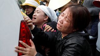 Trauer um Kühllaster-Opfer in Vietnam
