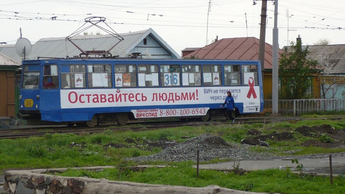 An HIV campaign logo on a tram in Russia