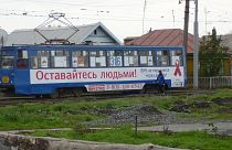 An HIV campaign logo on a tram in Russia