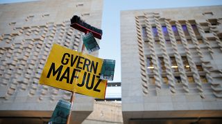 Sign reads "Mafia Government"