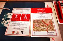 Rotta balcanica: i volantini anti-mine distribuiti ai migranti dalla Croce Rossa