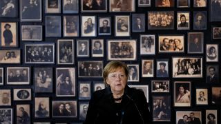 Merkel visits Auschwitz memorial for the first time after 14 years as Germany's Chancellor 