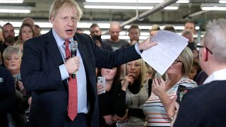 Britain's Prime Minister Boris Johnson delivers a speech during a meeting with workers as he visits John Smedley Mill in Matlock, Derbyshire, Britain December 5, 2019.
