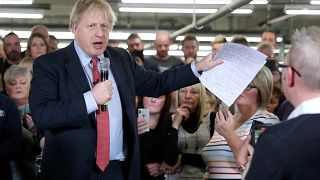 Britain's Prime Minister Boris Johnson delivers a speech during a meeting with workers as he visits John Smedley Mill in Matlock, Derbyshire, Britain December 5, 2019. 