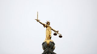 FILE PHOTO: Statue of Lady Justice is seen at Old Bailey central criminal court in London