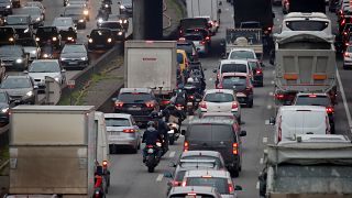 Rush hour traffic fills the ring road in Paris as a strike by French transportation workers continue to protest against French government's pensions reform plans.