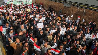 Iraqi demonstrators gather during ongoing anti-government protests in Baghdad