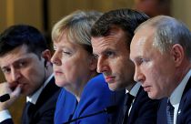 Ukraine's Volodymyr Zelenskiy (L), Germany's Angela Merkel, France's Emmanuel Macron, and Russia's Vladimir Putin in Paris on December 9, 2019.