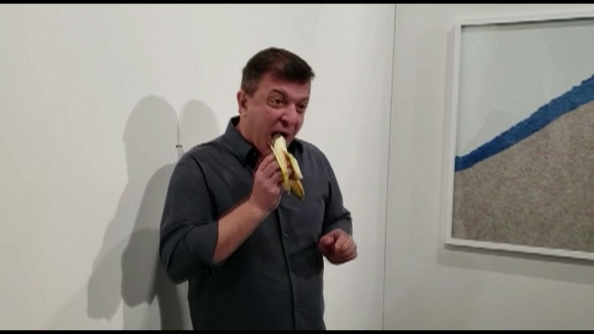 "Very tasty!": Watch moment artist eats $120,000 banana at Art Basel