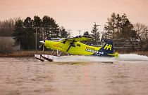 A Habour Air seaplane powered by an magniX all-electric propulsion system lands after a test flight on December 10, 2019.