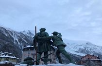  Chamonix, 12 December 2019 - Statue of Jaques Balmat showing Horace Benedict de Sassure the route up to the summit of Mont Blanc.