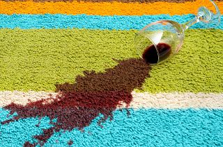 Red wine stains get on the carpet