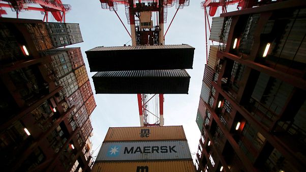 FILE PHOTO: Containers are seen unloadedat the Yangshan Deep Water Port, part of the Shanghai Free Trade Zone, in Shanghai, China, September 24, 2016. FILE PHOTO: Containers are seen unloadedat the Yangshan Deep Water Port, part of the Shanghai Free Trade Zone, in Shanghai, China, September 24, 2016.